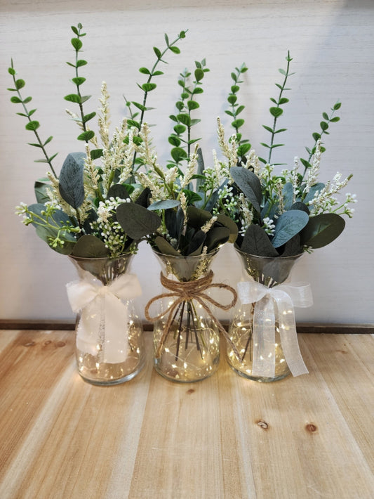 Eucalyptus and Babies Breath Lighted Bud Vase Centerpiece